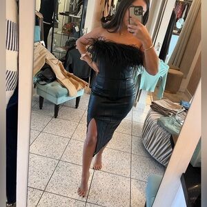 Black pleather dress with feathers